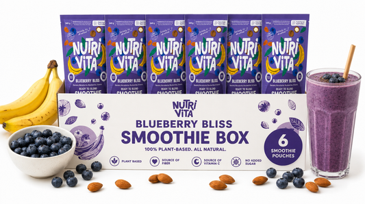 NutriVita Blueberry Bliss Smoothie Box with smoothie, bananas, blueberries, and almonds on a white background