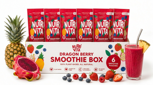 NutriVita Dragon Berry Smoothie Box with smoothie pouches, dragon fruit, pineapple, and berries on a white background.