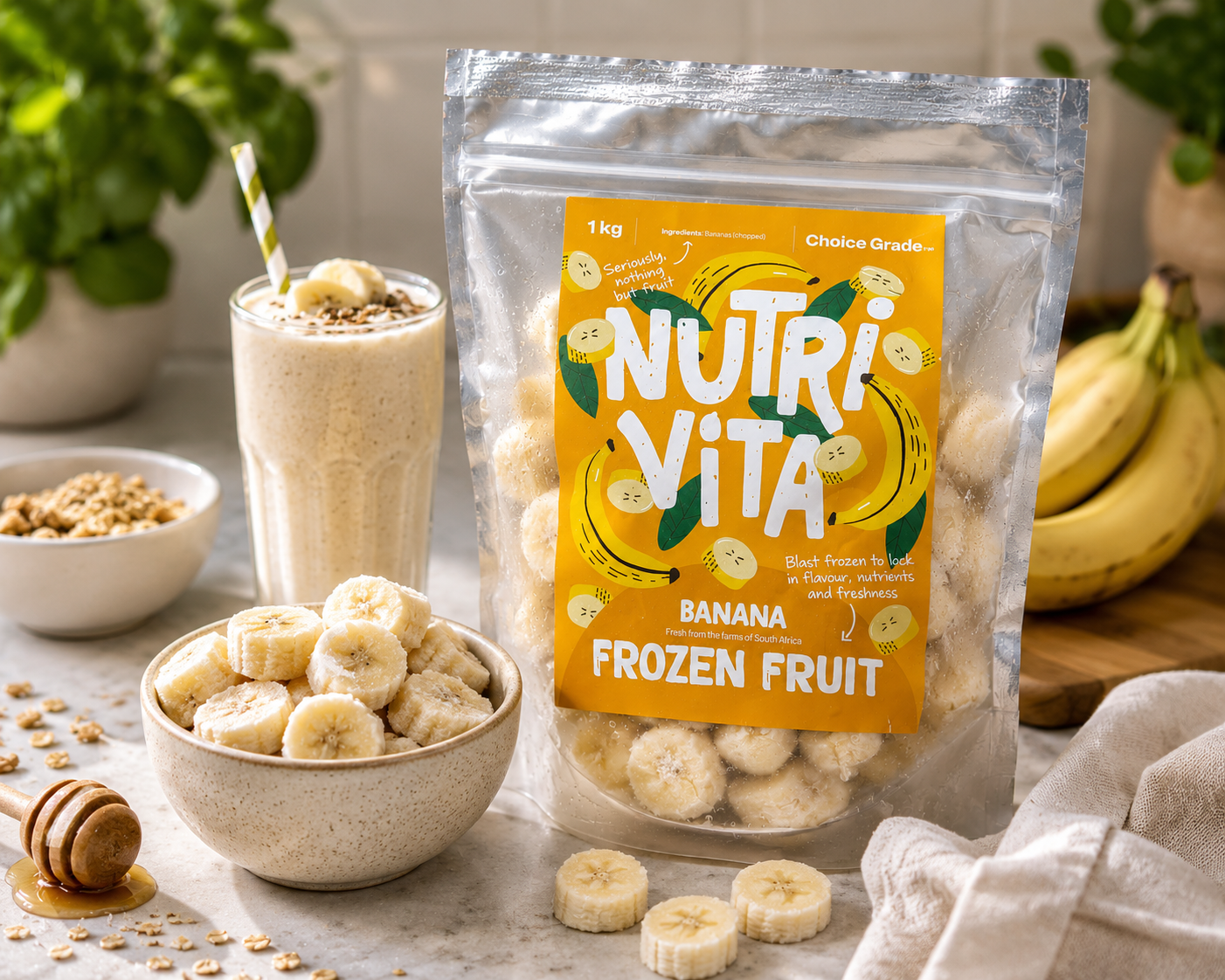 NutriVita banana frozen fruit package with a smoothie and bananas on a table.