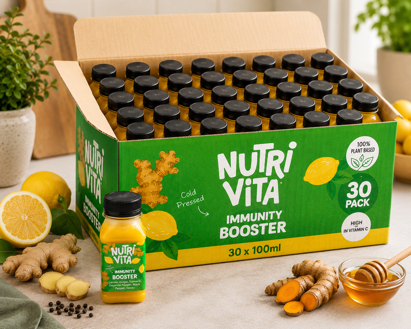 Box of NutriVita immunity booster drinks with ingredients on a table